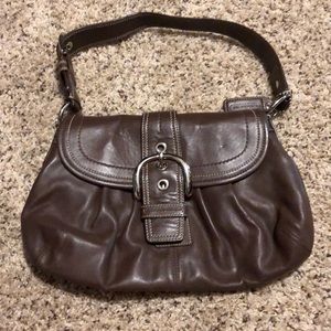 Brown leather coach